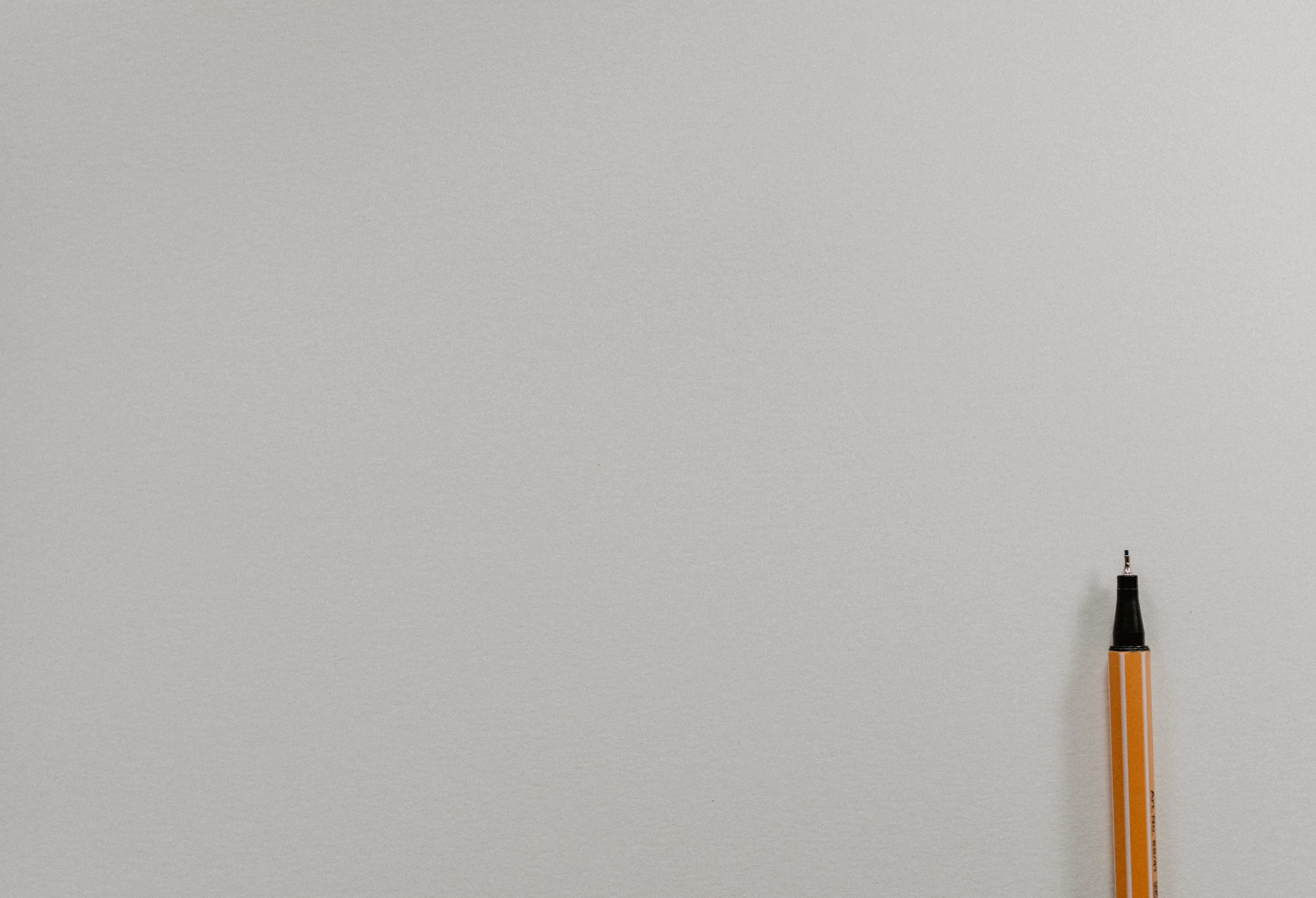 Minimal outdoor themed image with a pen on a light background